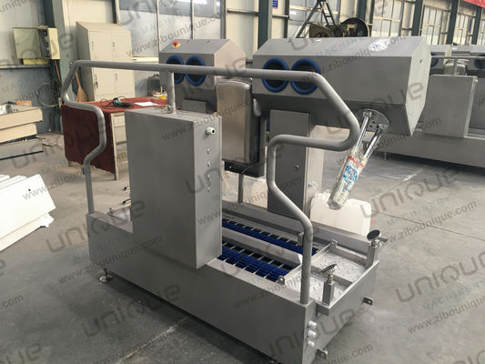 Stazione di pulizia automatica per calzature a bassa immersione